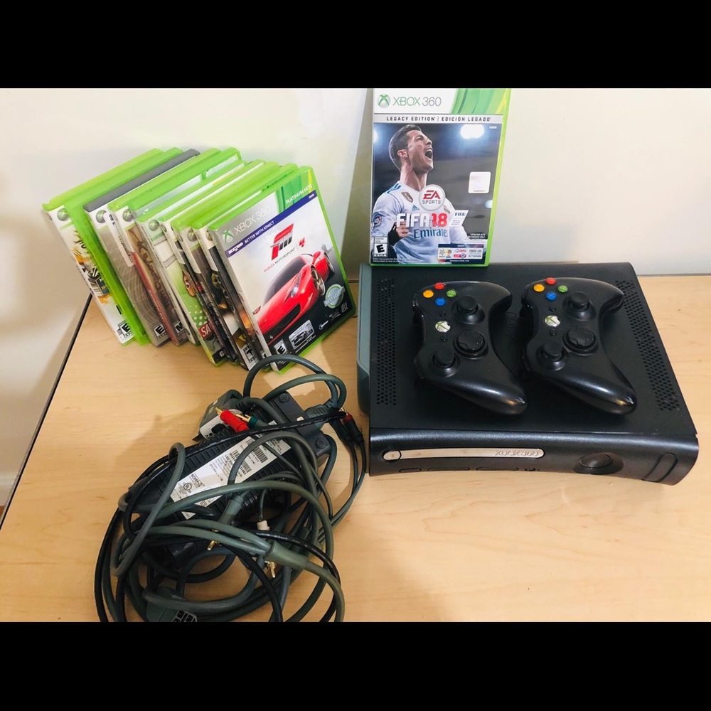 X box and around 5 games with 2 controllers